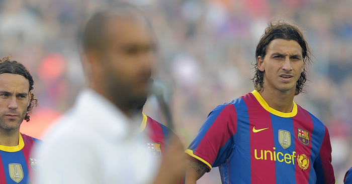 Barcelona's Swedish forward Zlatan Ibrahimovic (R) listens to his coach Josep Guardiola (Front) prior to their 45th Trophy Joan Gamper friendly football match against AC Milan at Camp Nou stadium in Barcelona on August 25, 2010. AFP PHOTO/ JOSEP LAGO (Photo credit should read JOSEP LAGO/AFP/Getty Images)