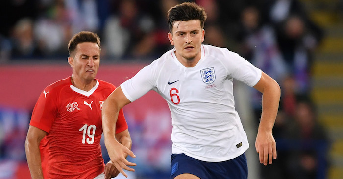 LEICESTER, ENGLAND - SEPTEMBER 11: Harry Maguire of England is chased by Mario Gavranovic of Switzerland during the international friendly match between England and Switzerland at The King Power Stadium on September 11, 2018 in Leicester, United Kingdom. (Photo by Laurence Griffiths/Getty Images)