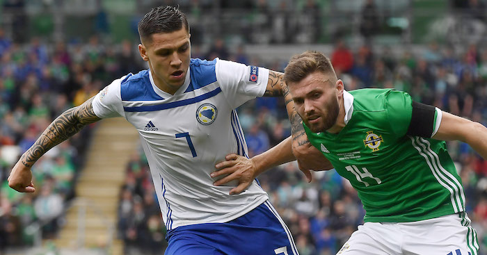 BELFAST, NORTHERN IRELAND - SEPTEMBER 08: Stuart Dallas of Northern Ireland and Muhamed Besic of Bosnia-Herzegovina during the UEFA Nations League B group three match between Northern Ireland and Bosnia-Herzegovina at Windsor Park on September 8, 2018 in Belfast, Northern Ireland. (Photo by Charles McQuillan/Getty Images)