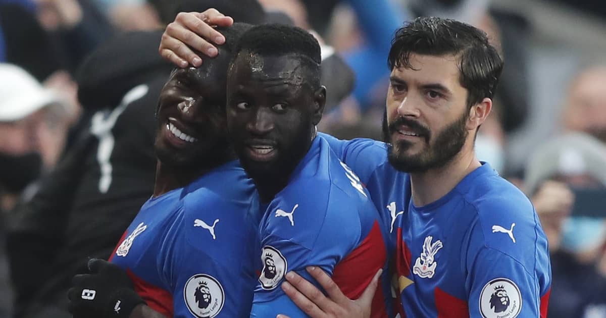 Christian Benteke, Cheikhou Kouyate and James Tomkins celebrating for Crystal Palace, May 2021, TEAMtalk Christian Benteke, Cheikhou Kouyate and James Tomkins celebrating for Crystal Palace, May 2021
