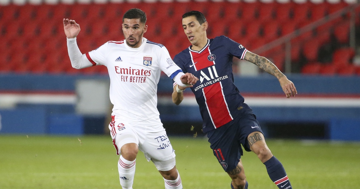 Houssem Aouar holds off Angel Di Maria in Lyon against PSG