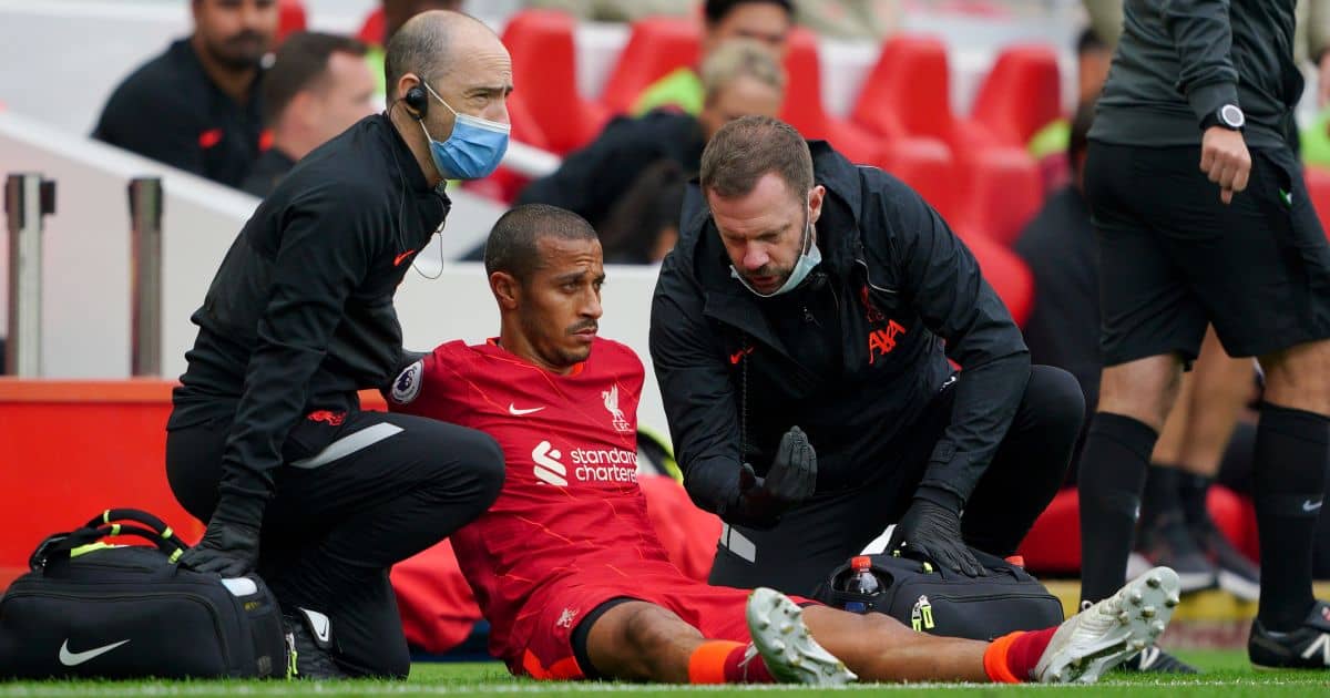 Liverpool midfielder Thiago Alcantara receives treatment for a calf injury on the touchline at Anfield, September 2021 Liverpool midfielder Thiago Alcantara