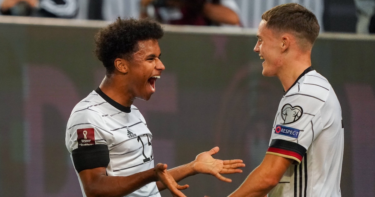 Florian Wirtz celebrates with Karim Adeyemi as Germany score goal Florian Wirtz Man Utd target