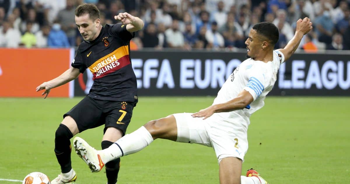 Marseille defender William Saliba, on loan from Arsenal, puts in a slide tackle on Galatasaray's Kerem Akturkoglu, September 2021 William Saliba, Kerem Akturkoglu September 2021