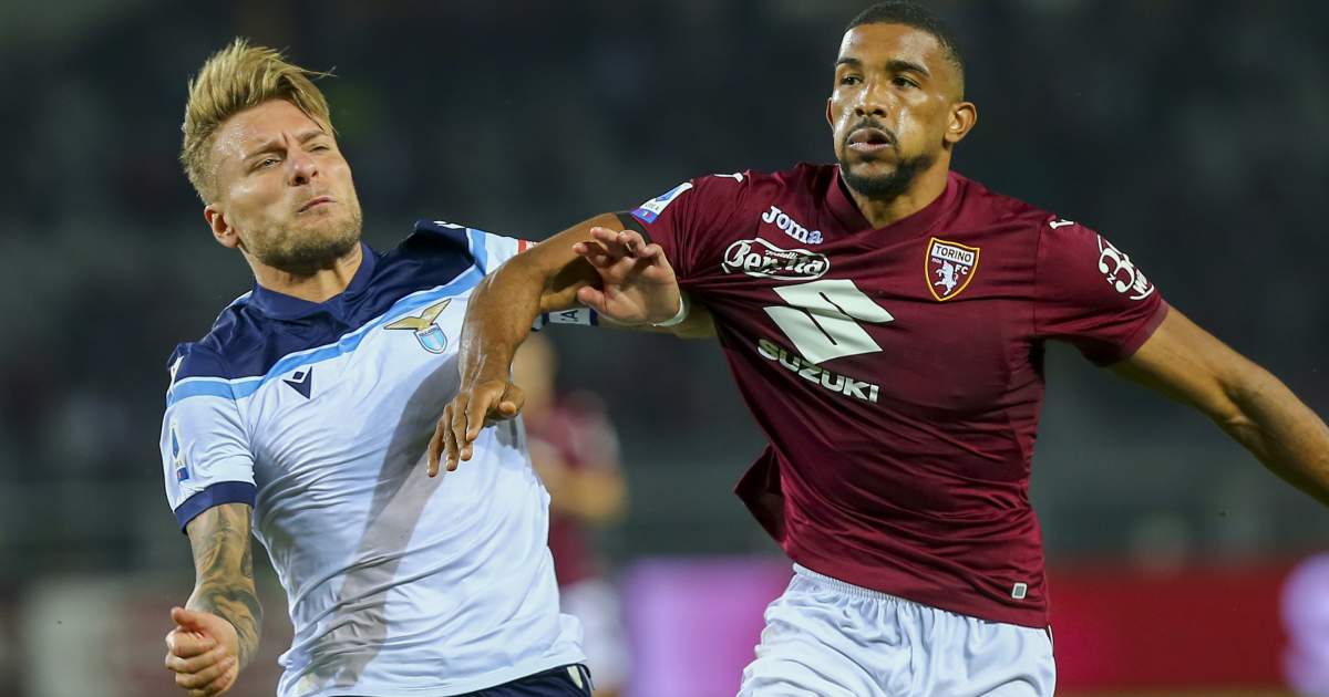 Ciro Immobile tussles with Gleison Bremer during Lazio vs Torino, September 2021