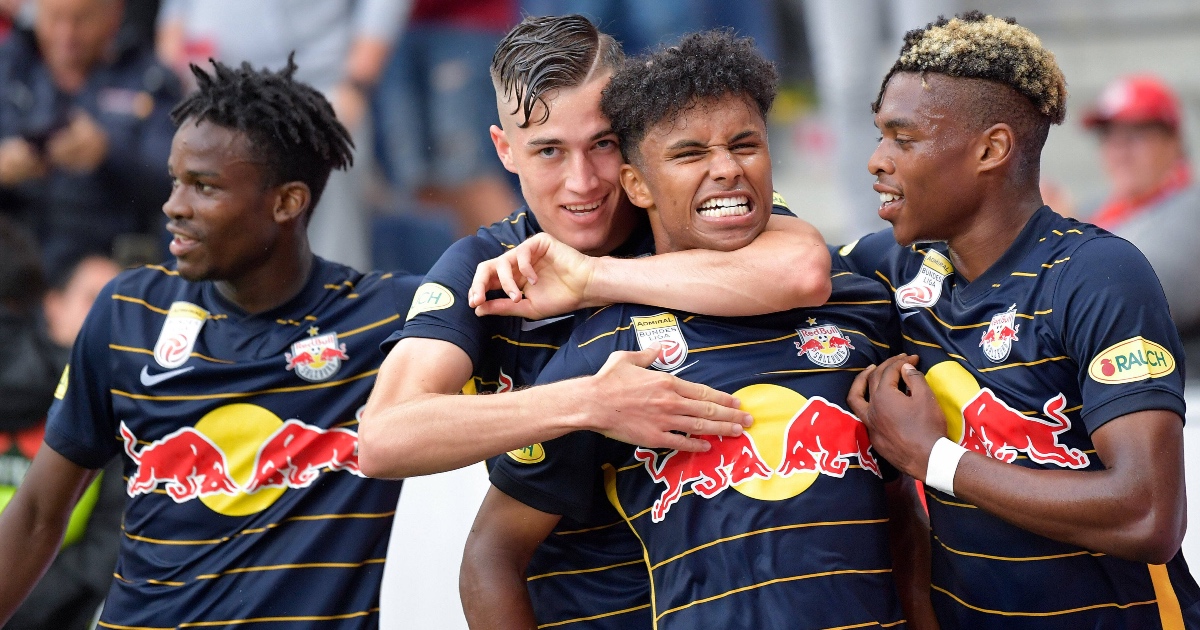 Karim Adeyemi celebrates with team-mates after scoring in friendly against Atletico Madrid in July 2021 Karim Adeyemi