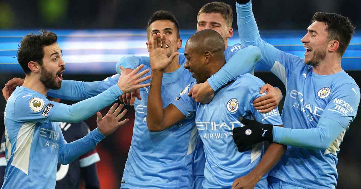 Manchester City players Bernardo Silva, Joao Cancelo, Ruben Dias and Aymeric Laporte celebrate with Fernandinho after he scored vs West Ham, November 2021 Manchester City players Bernardo Silva, Joao Cancelo, Ruben Dias and Aymeric Laporte celebrate with Fernandinho after he scored vs West Ham, November 2021