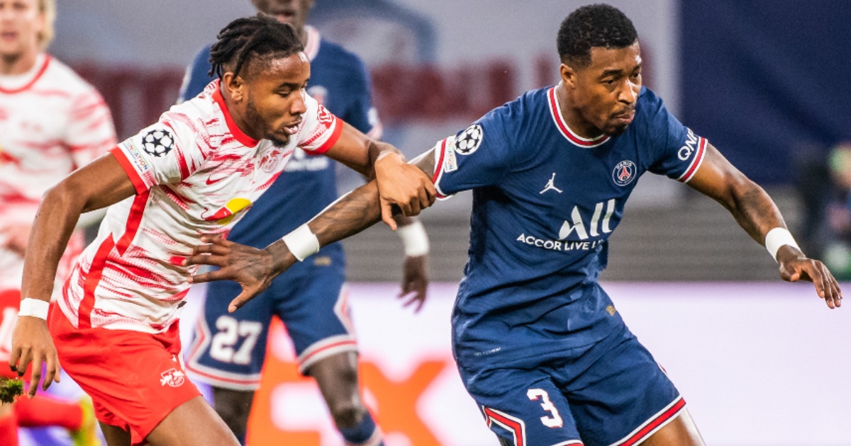 Presnel Kimpembe holds off Christopher Nkunku for PSG in Champions League clash Presnel Kimpembe PSG