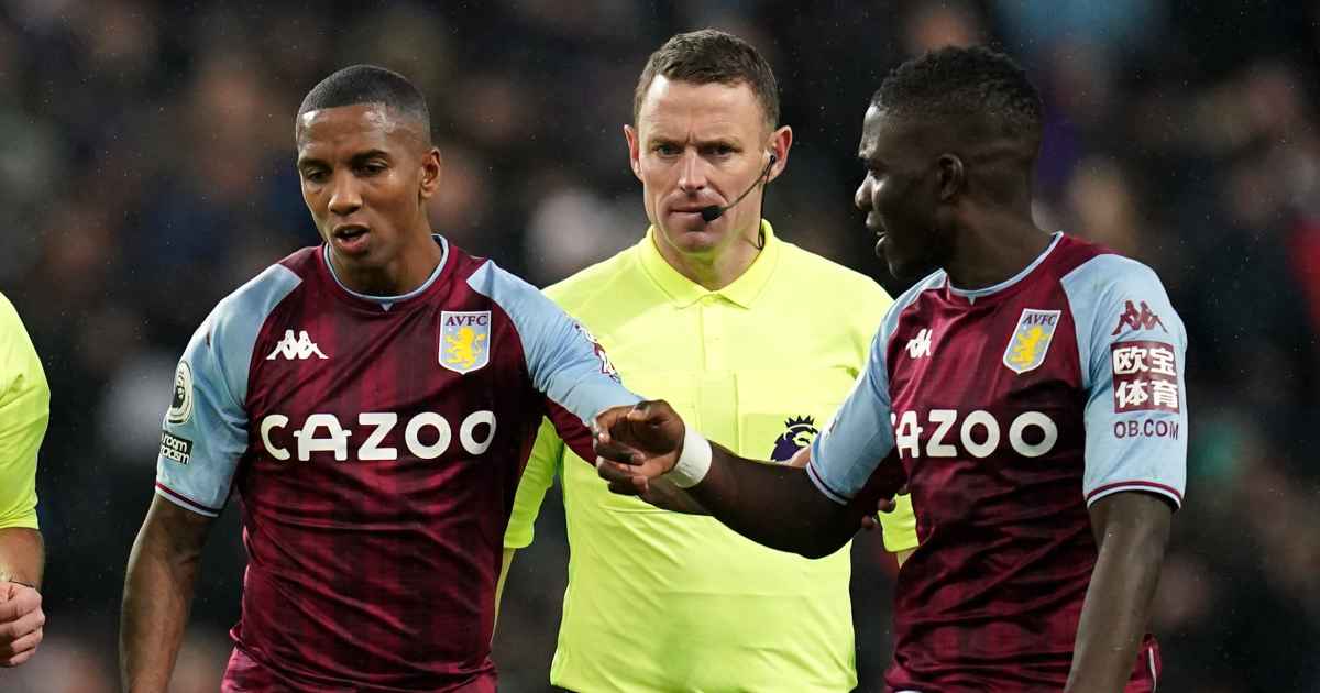 Ashley Young and Marvelous Nakamba speaking with the officials Ashley Young and Marvelous Nakamba after an Aston Villa game