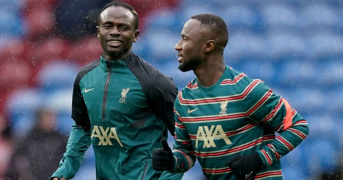 Sadio Mane and Naby Keita, Liverpool FC players warm up ahead of Premier League game v Burnley at Turf Moor