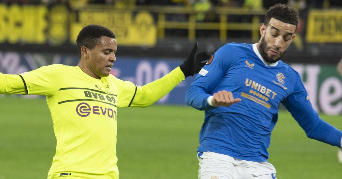 Manuel Akanji challenging Connor Goldson
