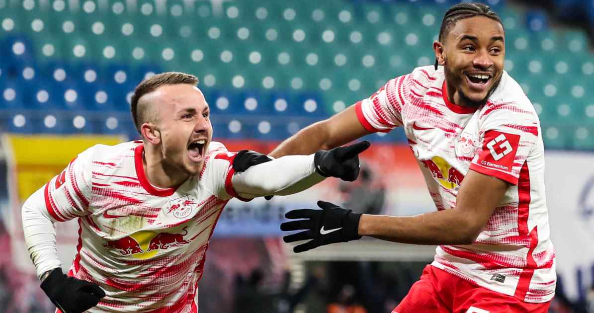 Angelino and Christopher Nkunku celebrate