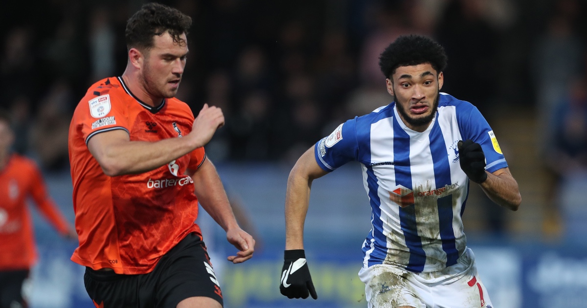 Tyler Burey and Harrison McGahey in action during Millwall vs Oldham Tyler Burey of Millwall