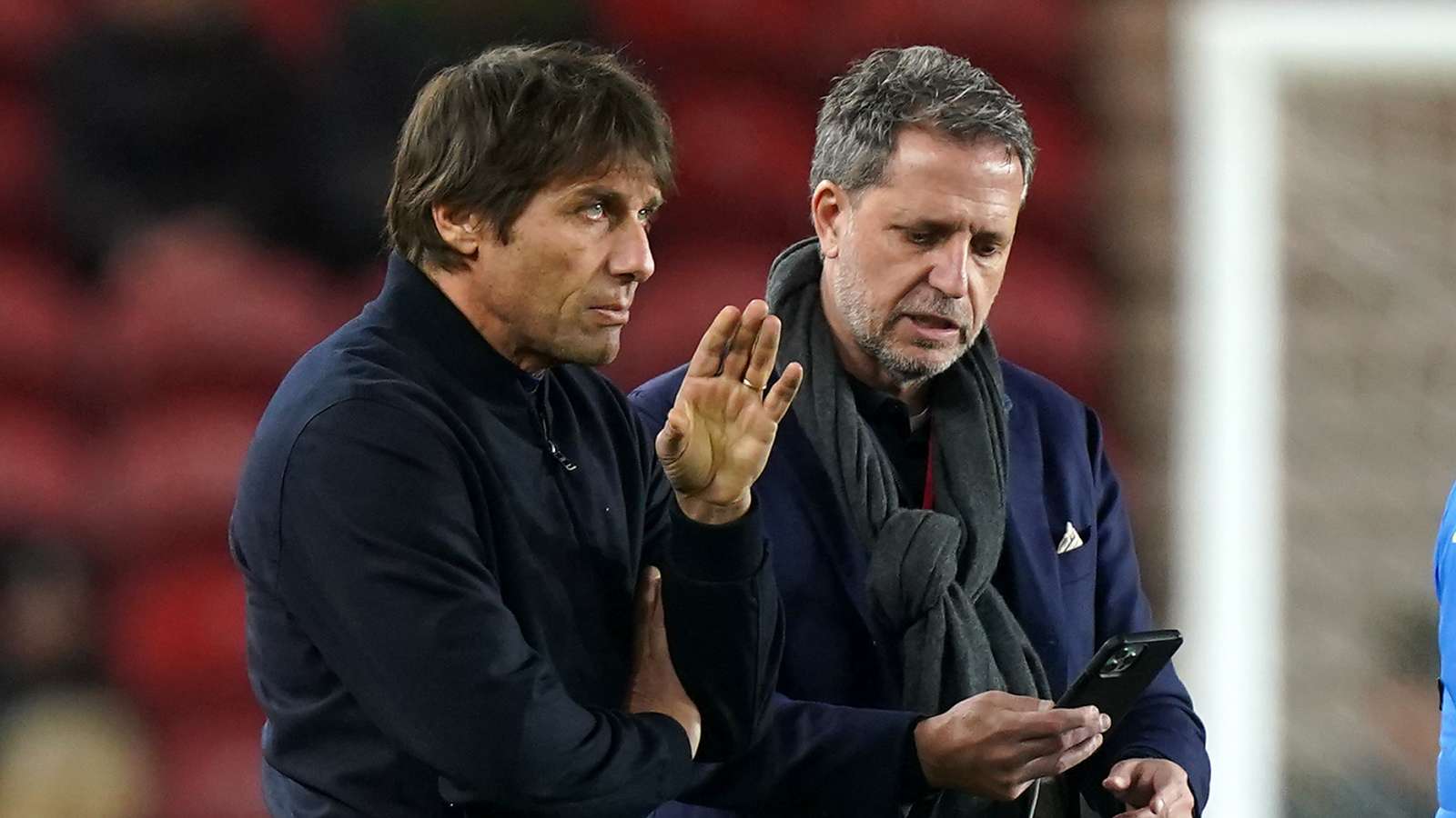 Antonio Conte chats to Fabio Paratici of Tottenham