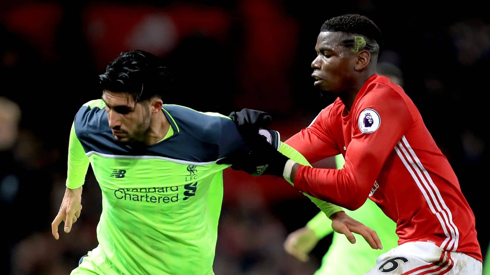 Emre Can Can battles with Paul Pogba during Premier League game between Man Utd and Liverpool