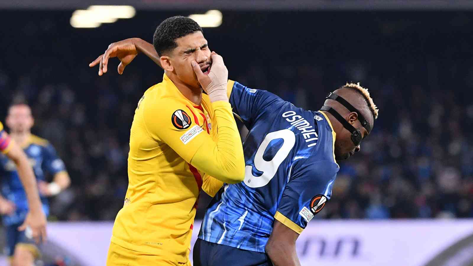 Ronald Araujo and Victor Osimhen contest possession