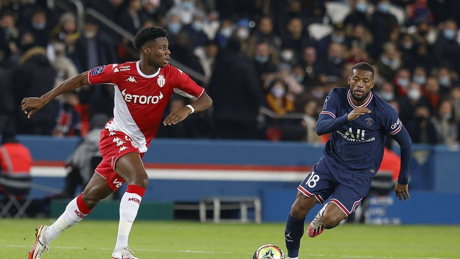 Georginio Wijnaldum tries to take the ball off Aurelien Tchouameni as PSG play Monaco, December 2021 Georginio Wijnaldum, Aurelien Tchouameni PSG v Monaco December 2021
