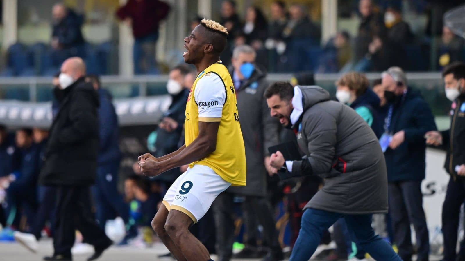 Victor Osimhen celebrates a Napoli goal against Hellas Verona from the sidelines, March 2022 Victor Osimhen, Hellas Verona v Napoli March 2022