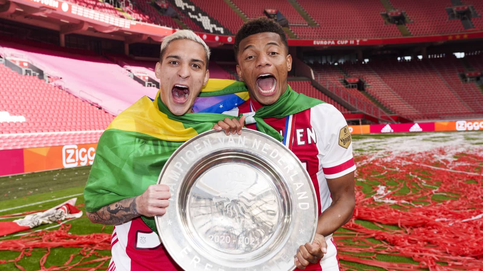 Antony celebrates winning trophy with Ajax team-mate David Neres Ajax stars Antony and David Neres