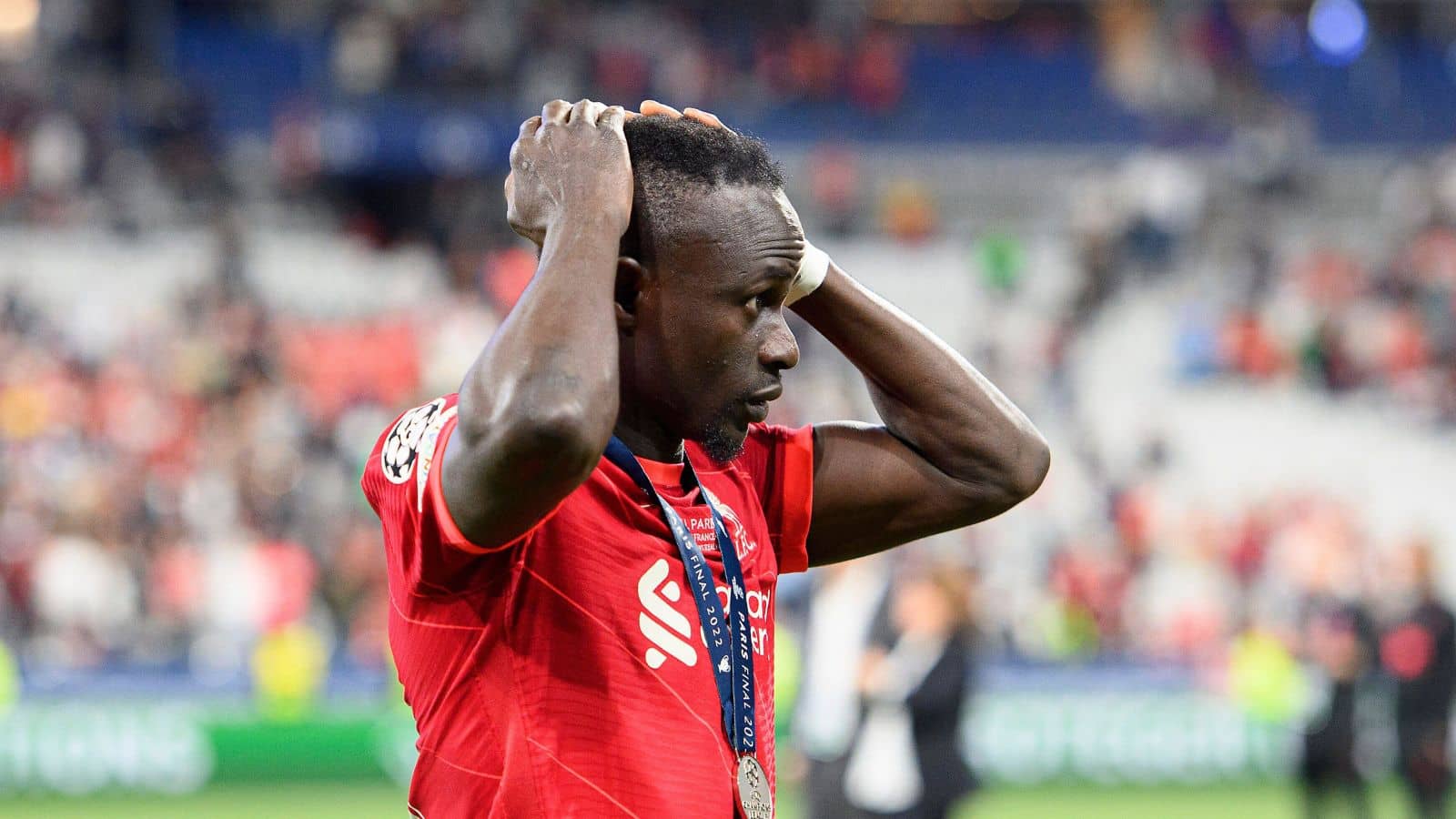 Sadio Mane reacts as he collects his Champions League final runners-up medal after defeat to Real Madrid, May 2022 Sadio Mane, Liverpool v Real Madrid May 2022