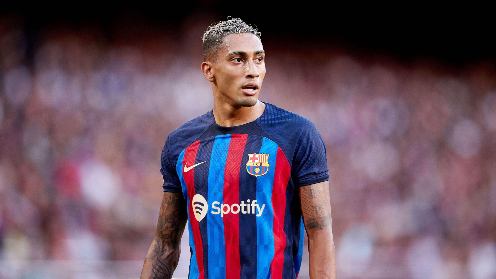  A photo of Raphinha playing for FC Barcelona with the caption 'Barcelona Raphinha for sale'.