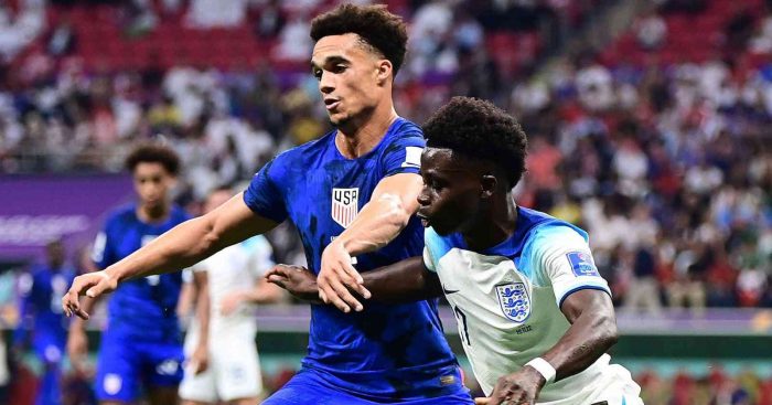Antonee Robinson tussling with Bukayo Saka