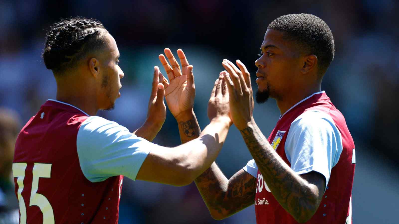 Cameron Archer celebrating with Leon Bailey