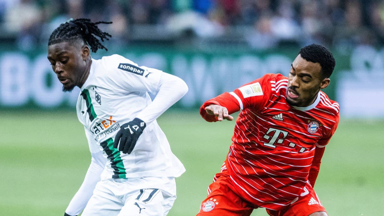 Borussia Monchengladbach midfielder Manu Kone and Bayern Munich star Ryan Gravenberch