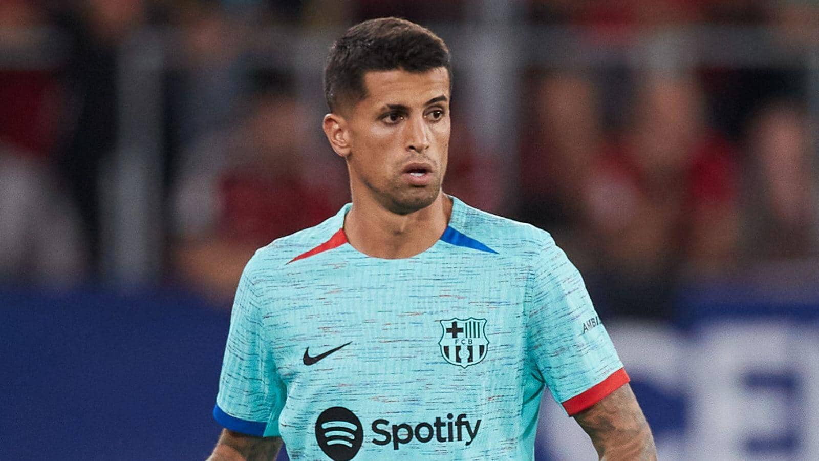 Joao Cancelo playing for Barcelona