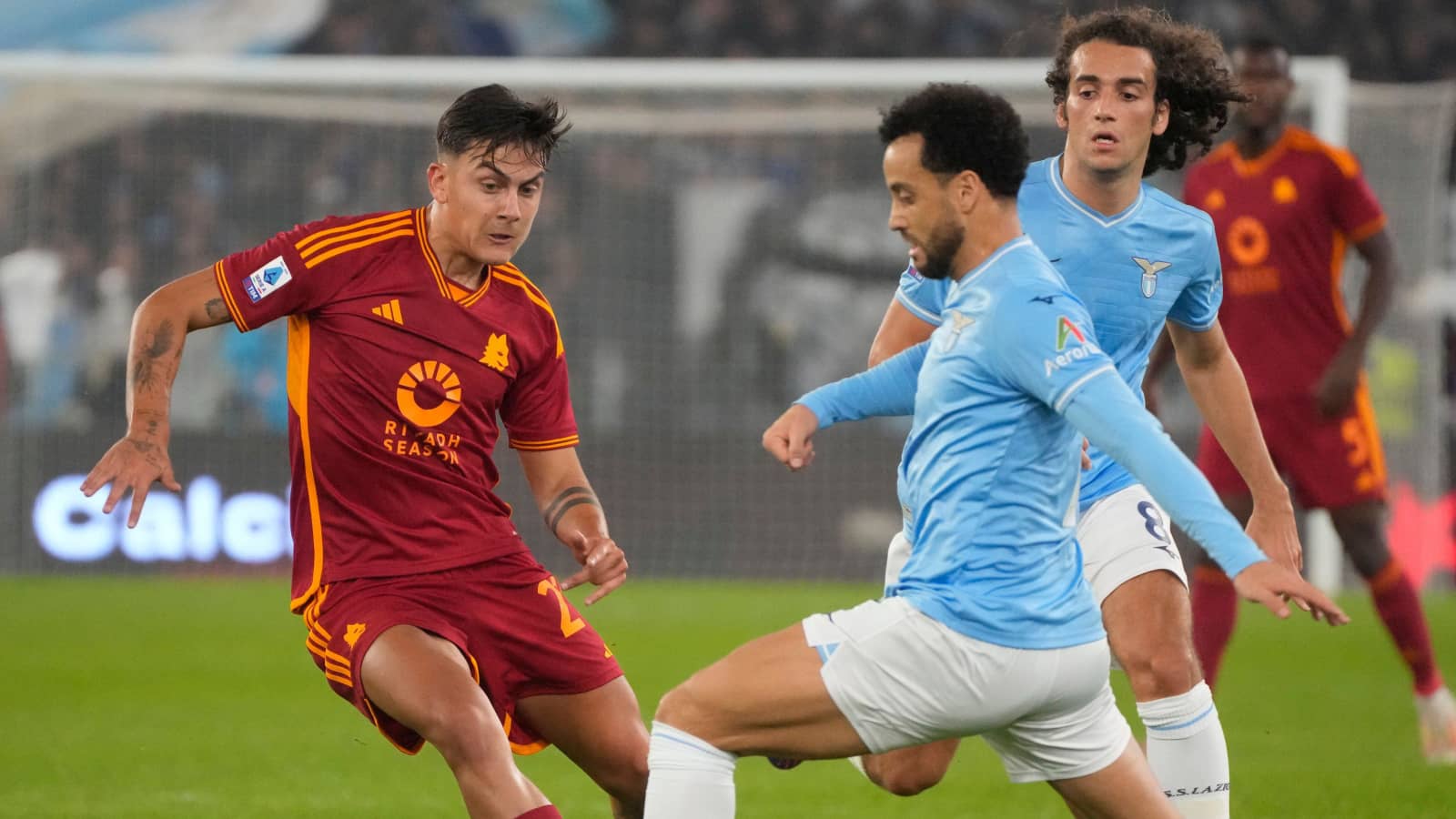 Roma forward Paulo Dybala and Lazio winger Felipe Anderson