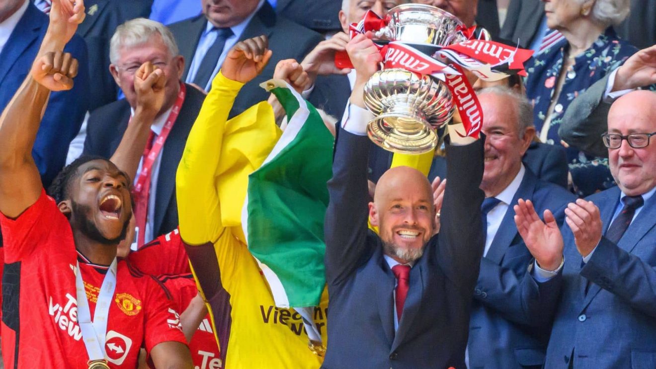 Erik ten Hag lifting FA Cup