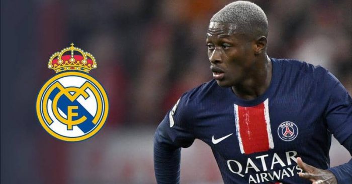 Paris Saint-Germain left-back Nuno Mendes next to the Real Madrid badge