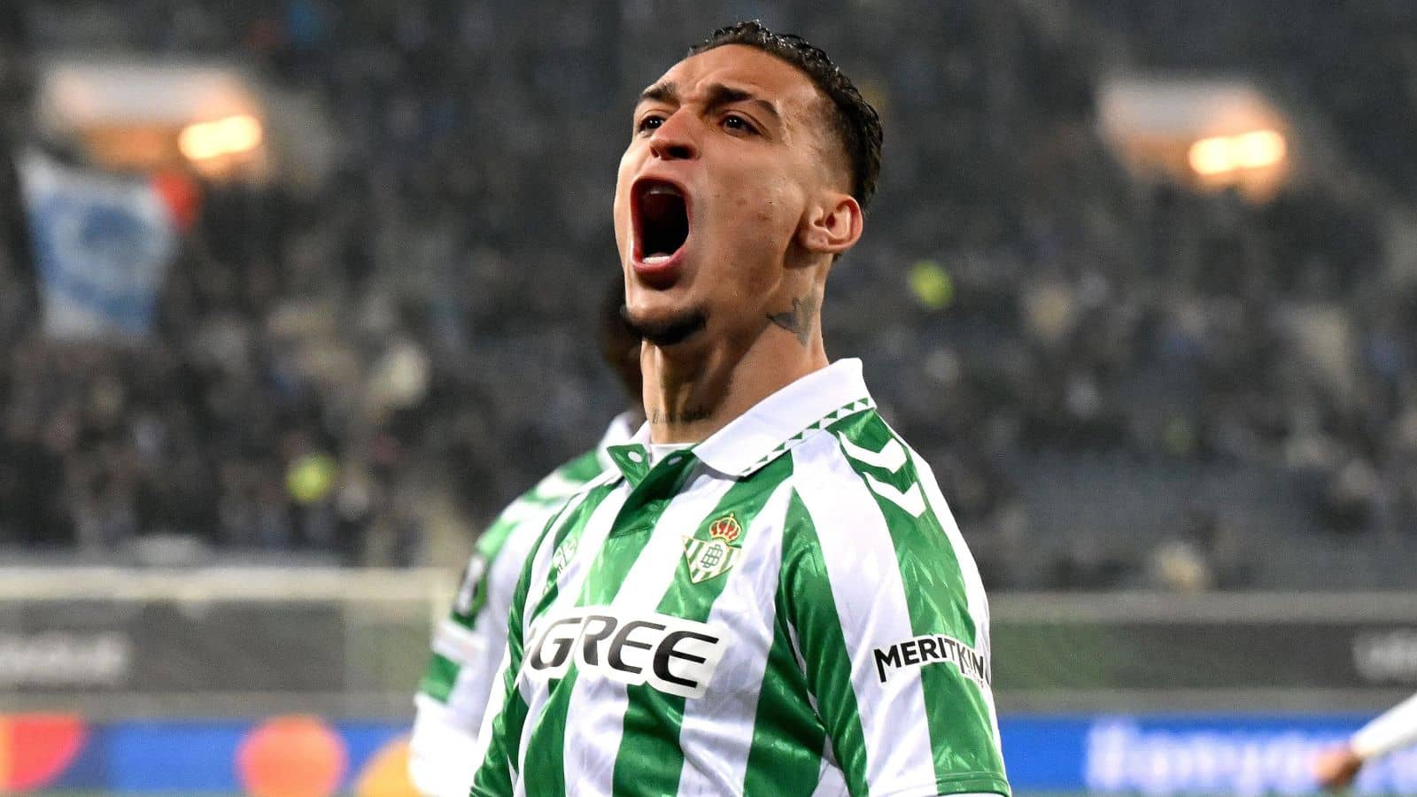 Antony celebrating in a Real Betis kit