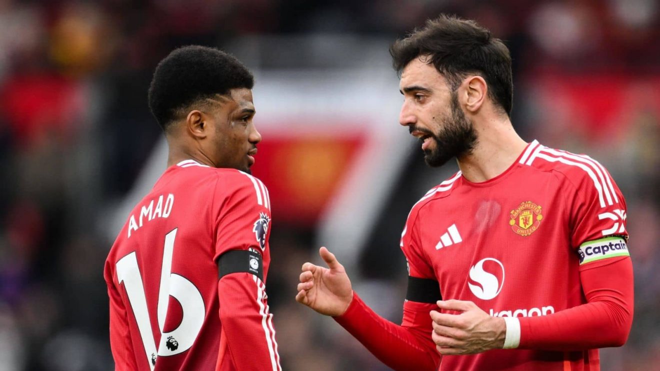Amad Diallo and Bruno Fernandes of Manchester United in action during a Premier League game at Old Trafford
