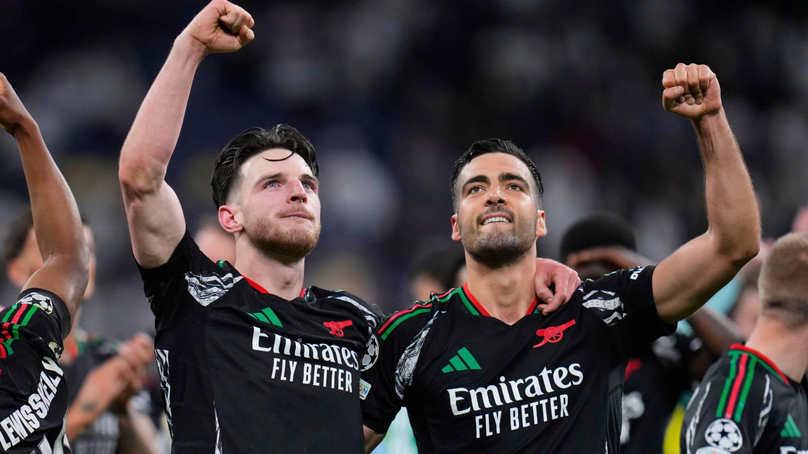 Arsenal duo Declan Rice and Mikel Merino celebrate victory over Real Madrid