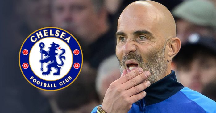 Chelsea boss Enzo Maresca next to the club crest