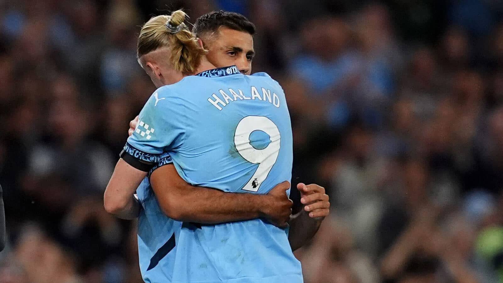 Manchester City duo Rodri and Erling Haaland - copyright TEAMtalk