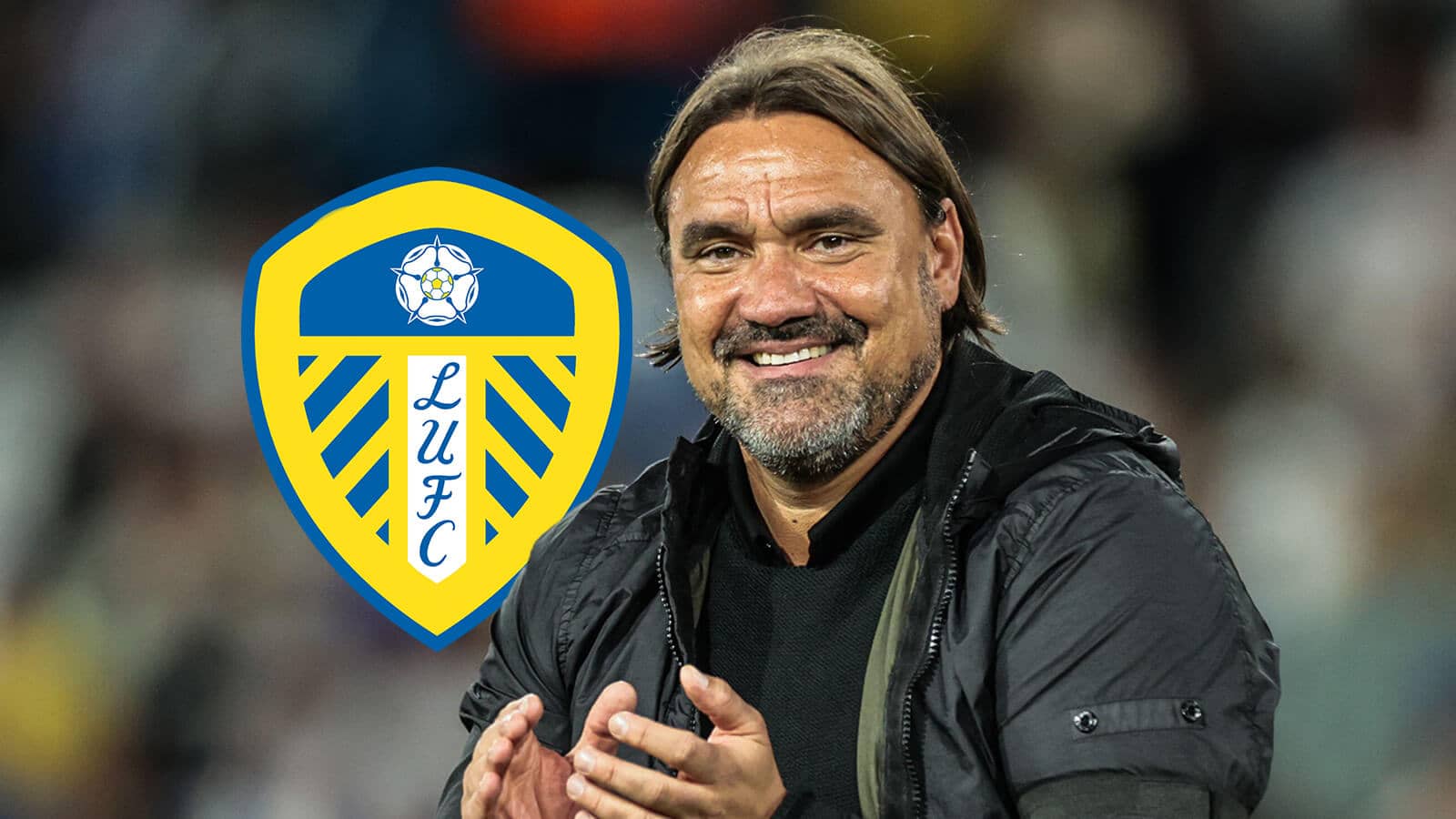Daniel Farke next to the Leeds United badge - copyright TEAMtalk