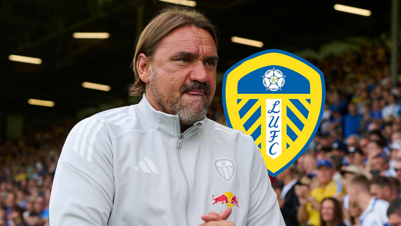 Daniel Farke next to the Leeds United badge - copyright TEAMtalk
