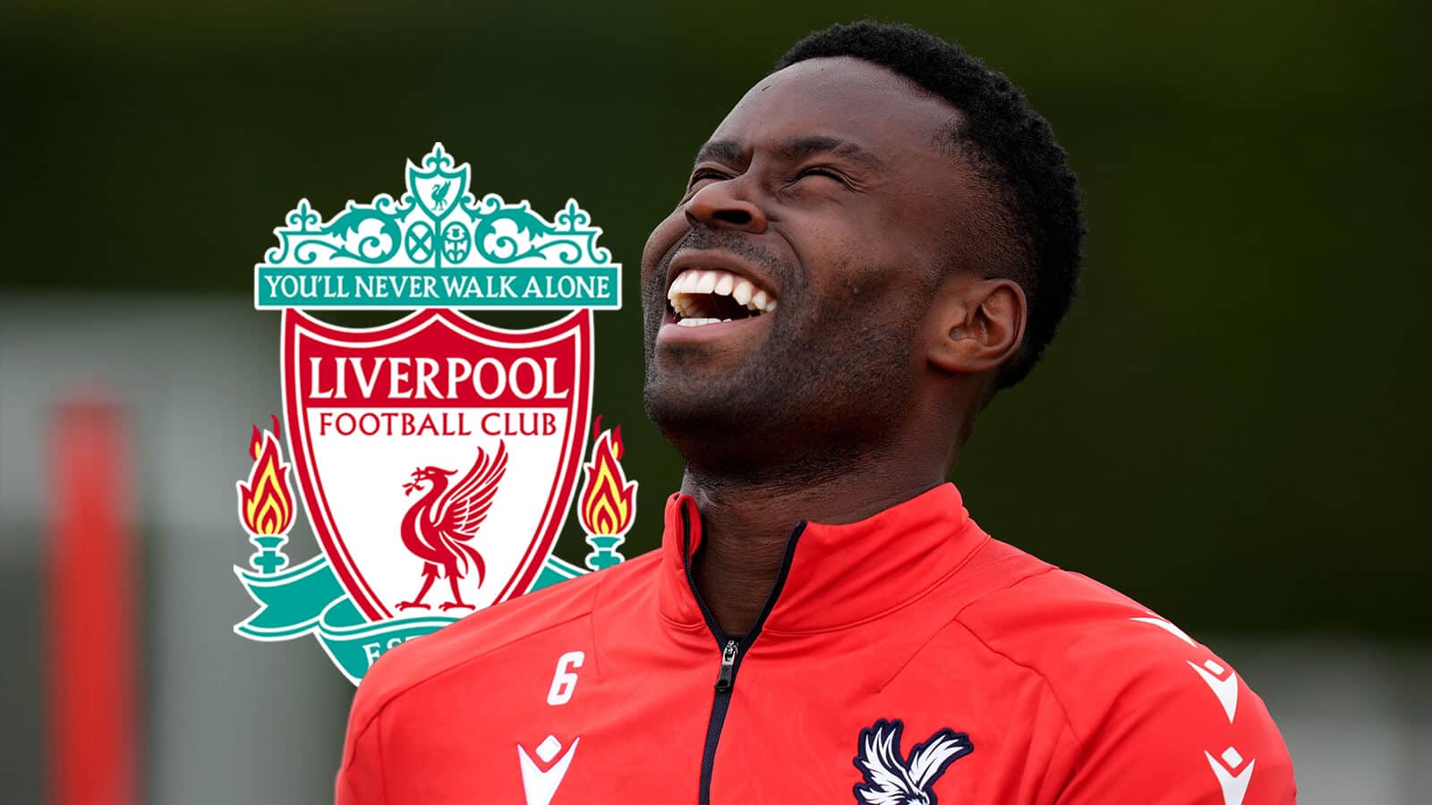 Crystal Palace star Marc Guehi laughing and pictured next to the Liverpool club crest