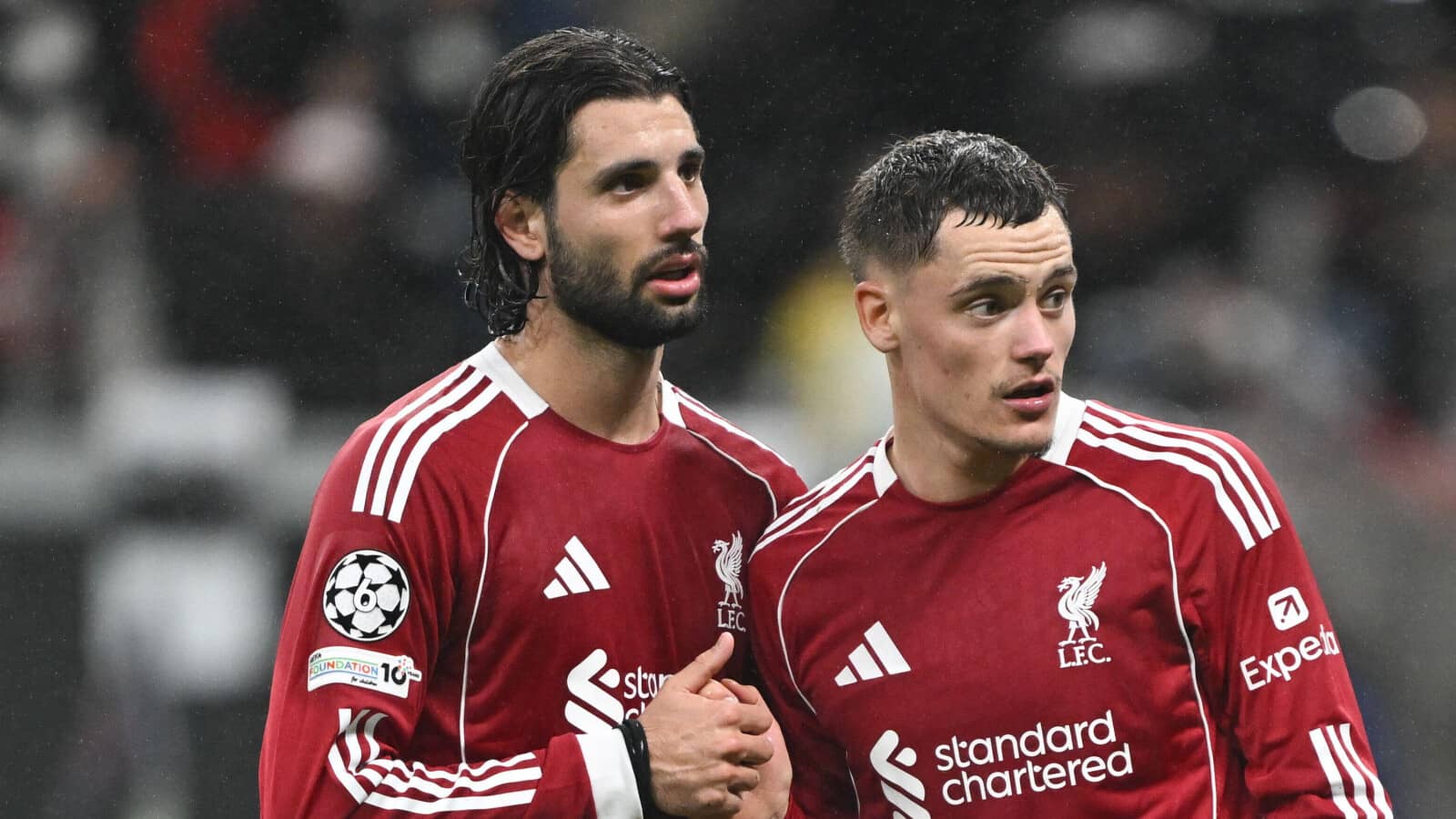 Liverpool's Dominik Szoboszlai and Florian Wirtz celebrate victory following the UEFA Champions League match at Deutsche Bank Park, Frankfurt