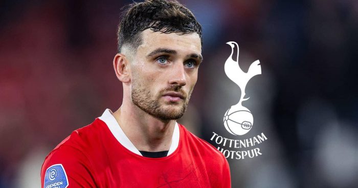 Troy Parrott with Tottenham badge