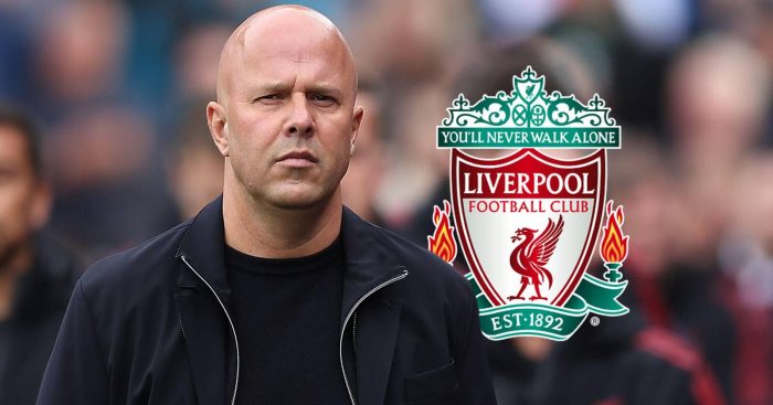 Arne Slot with a Liverpool badge