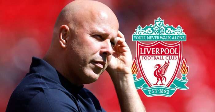 Liverpool manager Arne Slot next to the Liverpool FC badge