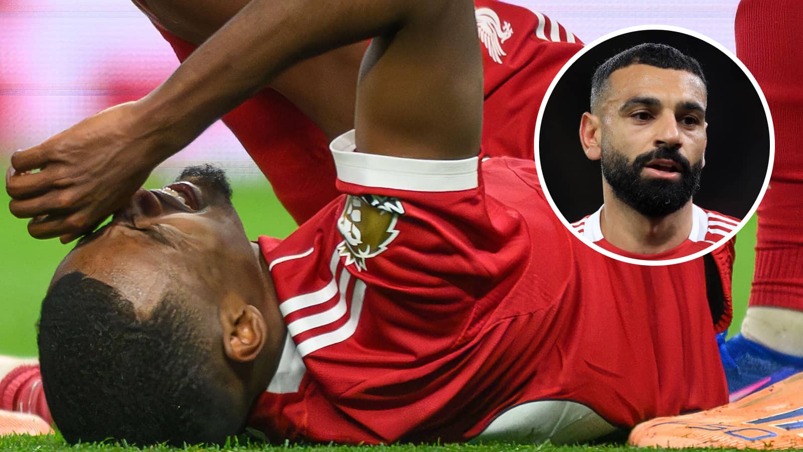 Alexander Isak down on the floor with an injury, and Mohamed Salah pictured in a bubble