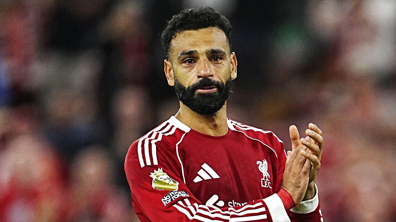 A teary-eyed Mohamed Salah does a lap of honour at Anfield after Liverpool's win over Brighton