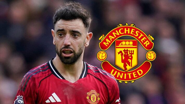 Bruno Fernandes with a Manchester United badge