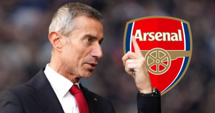 Arsenal sporting director Andrea Berta next to the club's badge