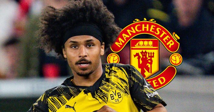 Borussia Dortmund winger Karim Adeyemi next to the Manchester United badge - copyright TEAMtalk