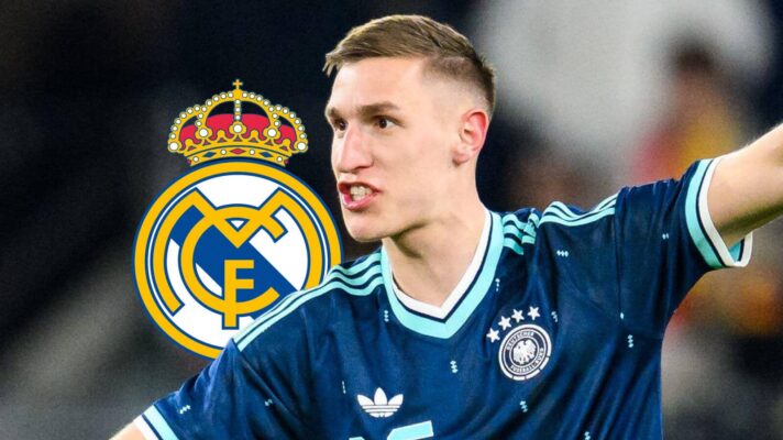 Borussia Dortmund and Germany star Nico Schlotterbeck next to the Real Madrid badge